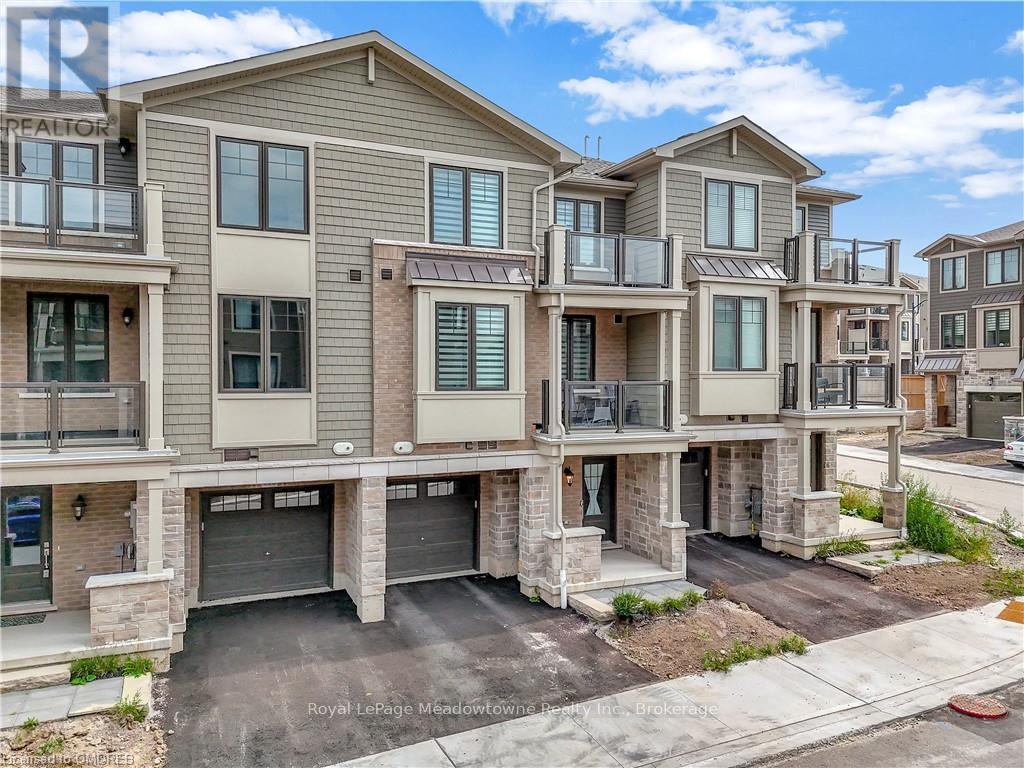 119 - 10 Birmingham Drive, Cambridge, ON - Outdoor With Balcony With Facade