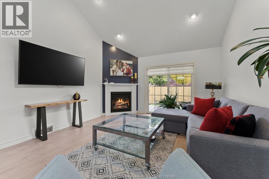 351 Boismier Avenue, Lasalle, ON - Indoor Photo Showing Living Room With Fireplace
