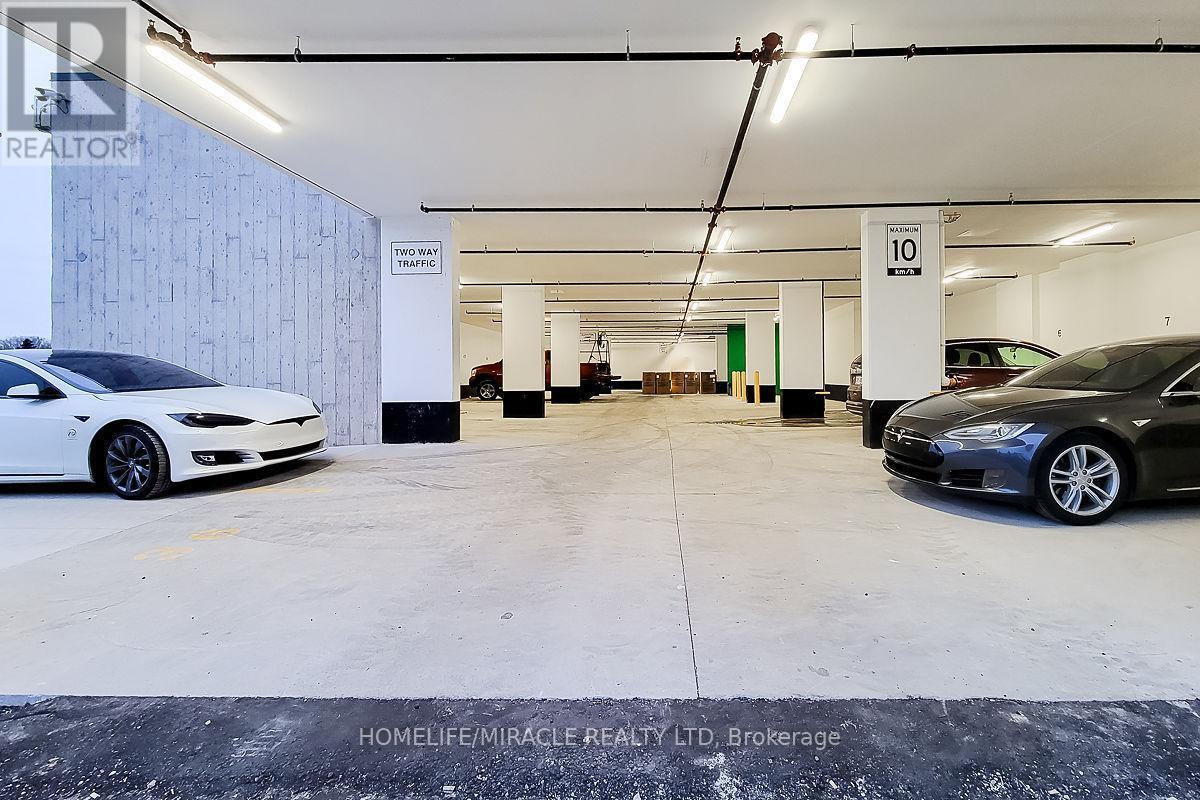 7 Erie Avenue, Brantford, ON - Indoor Photo Showing Garage