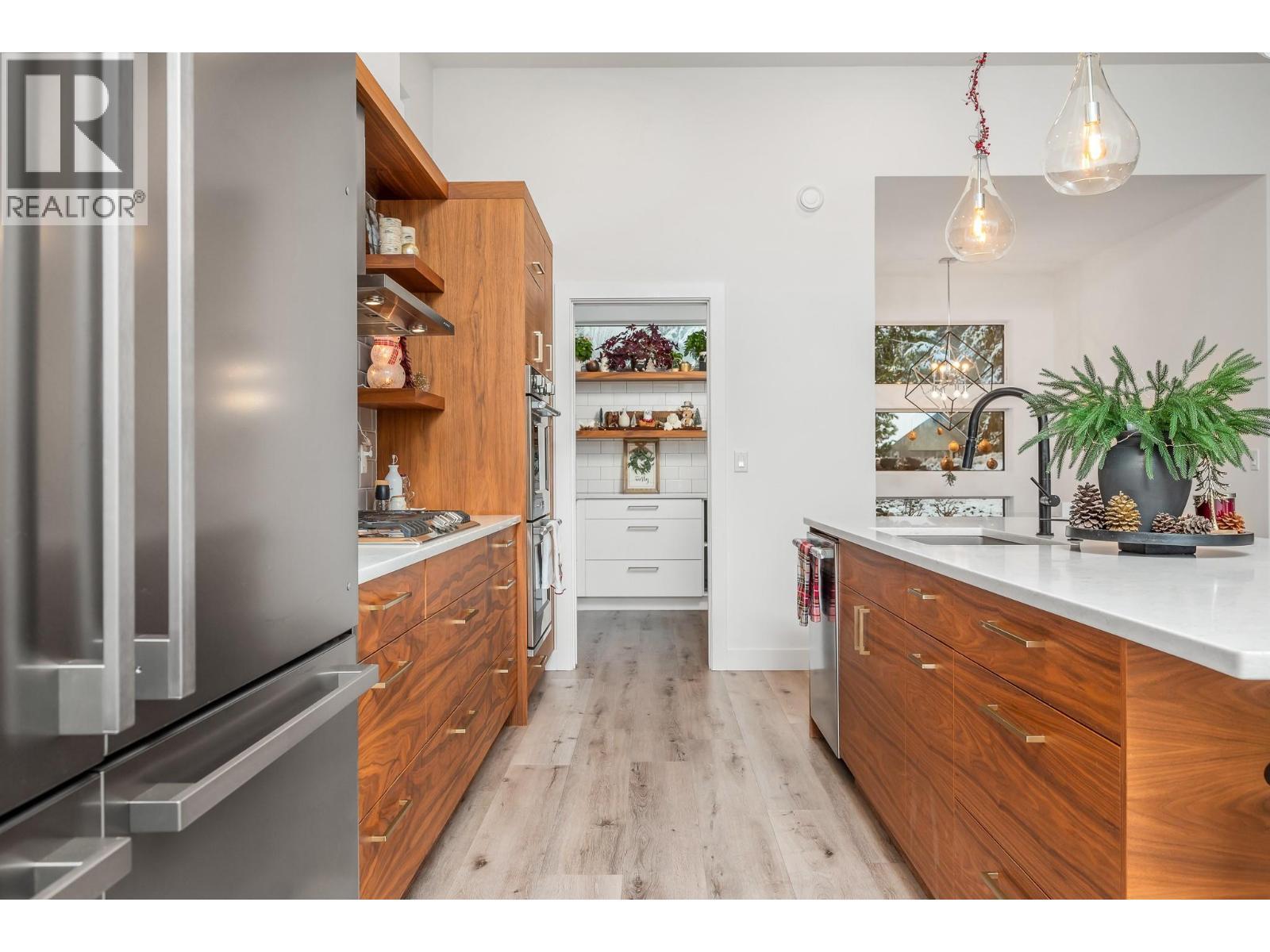 Through kitchen to butlers pantry - 9196 Tronson Road Unit# 29, Vernon, BC - Indoor Photo Showing Kitchen
