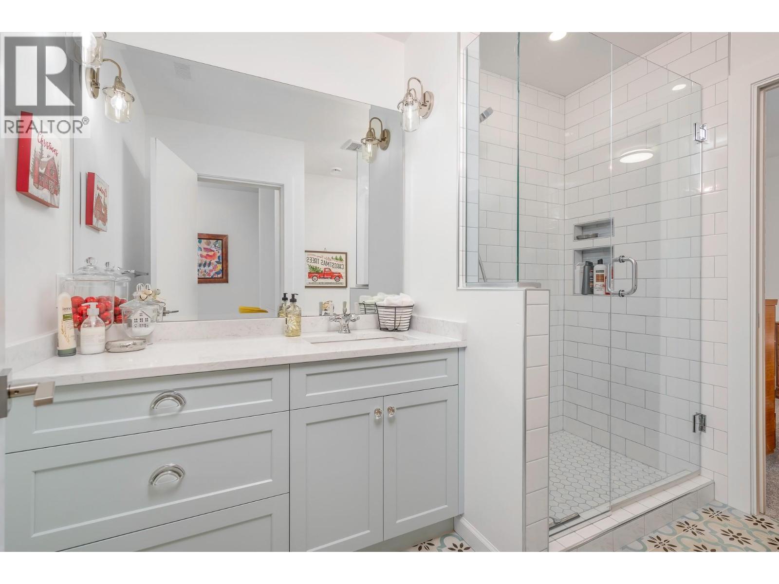 Lower level: Beds 4 and 5 share a bathroom - 9196 Tronson Road Unit# 29, Vernon, BC - Indoor Photo Showing Bathroom