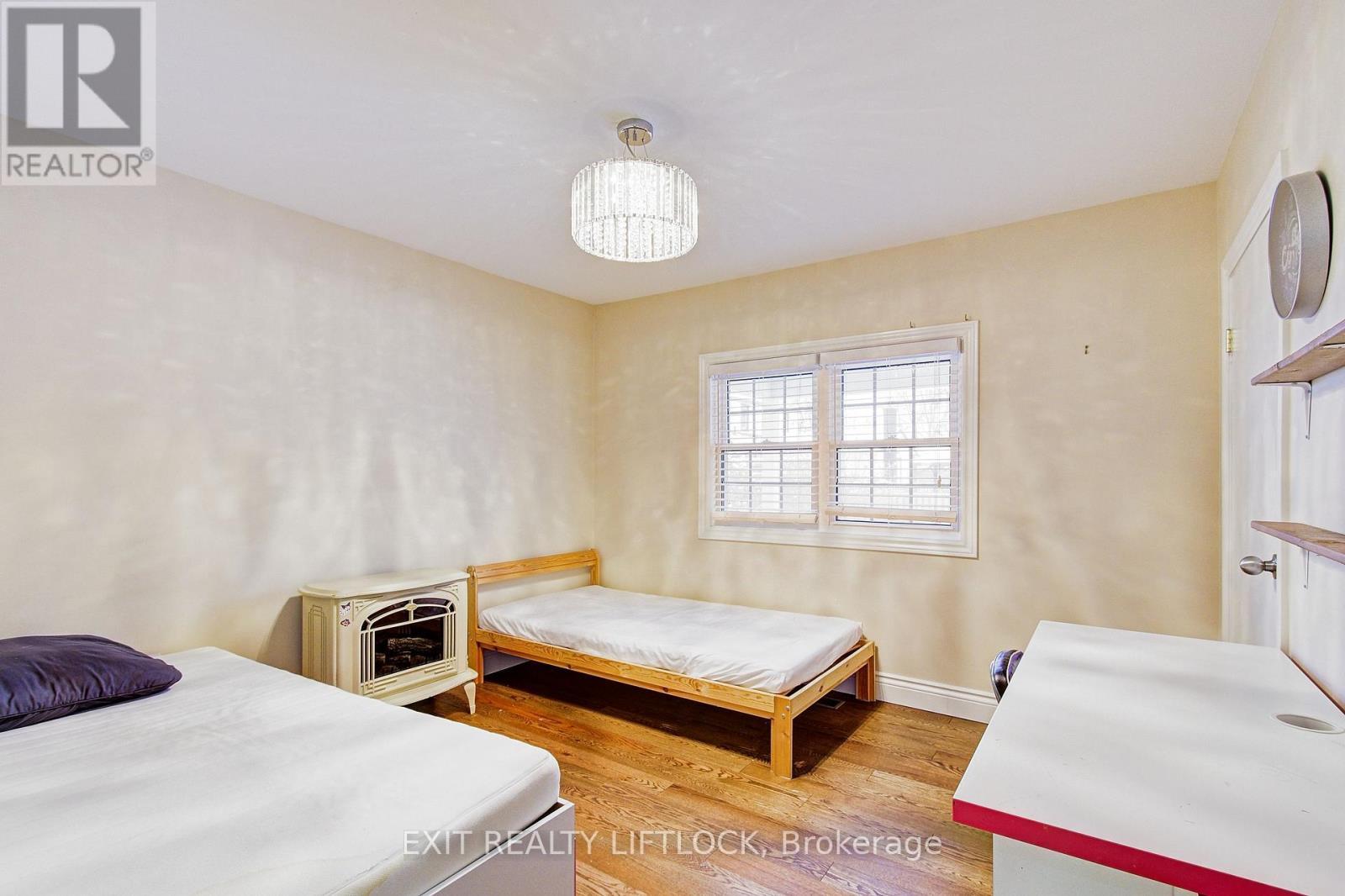 (Main) - 3 Reid Street, Selwyn, ON - Indoor Photo Showing Bedroom
