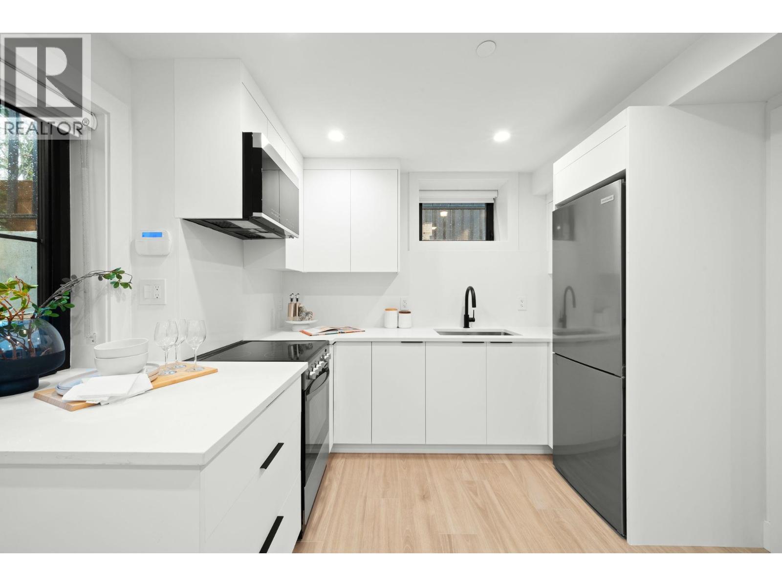 1 2791 W 21St Avenue, Vancouver, BC - Indoor Photo Showing Kitchen With Upgraded Kitchen