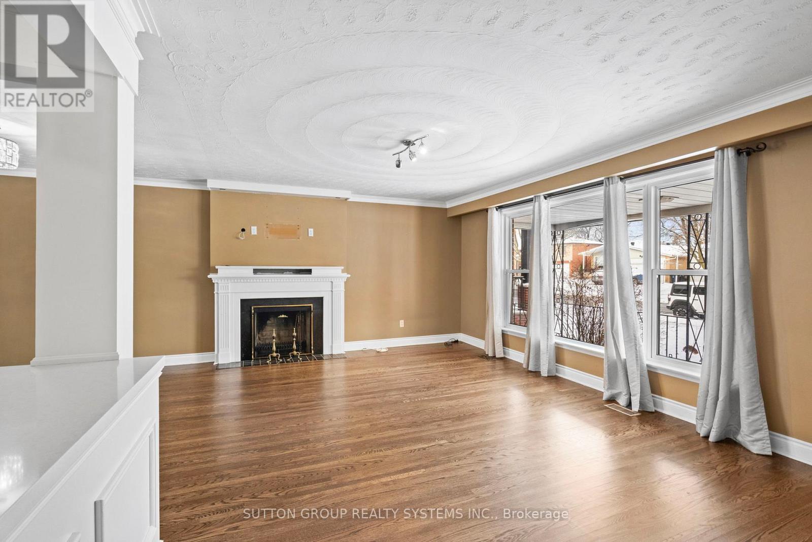 Main Floor - 103 Summitcrest Drive, Toronto, ON - Indoor Photo Showing Living Room With Fireplace