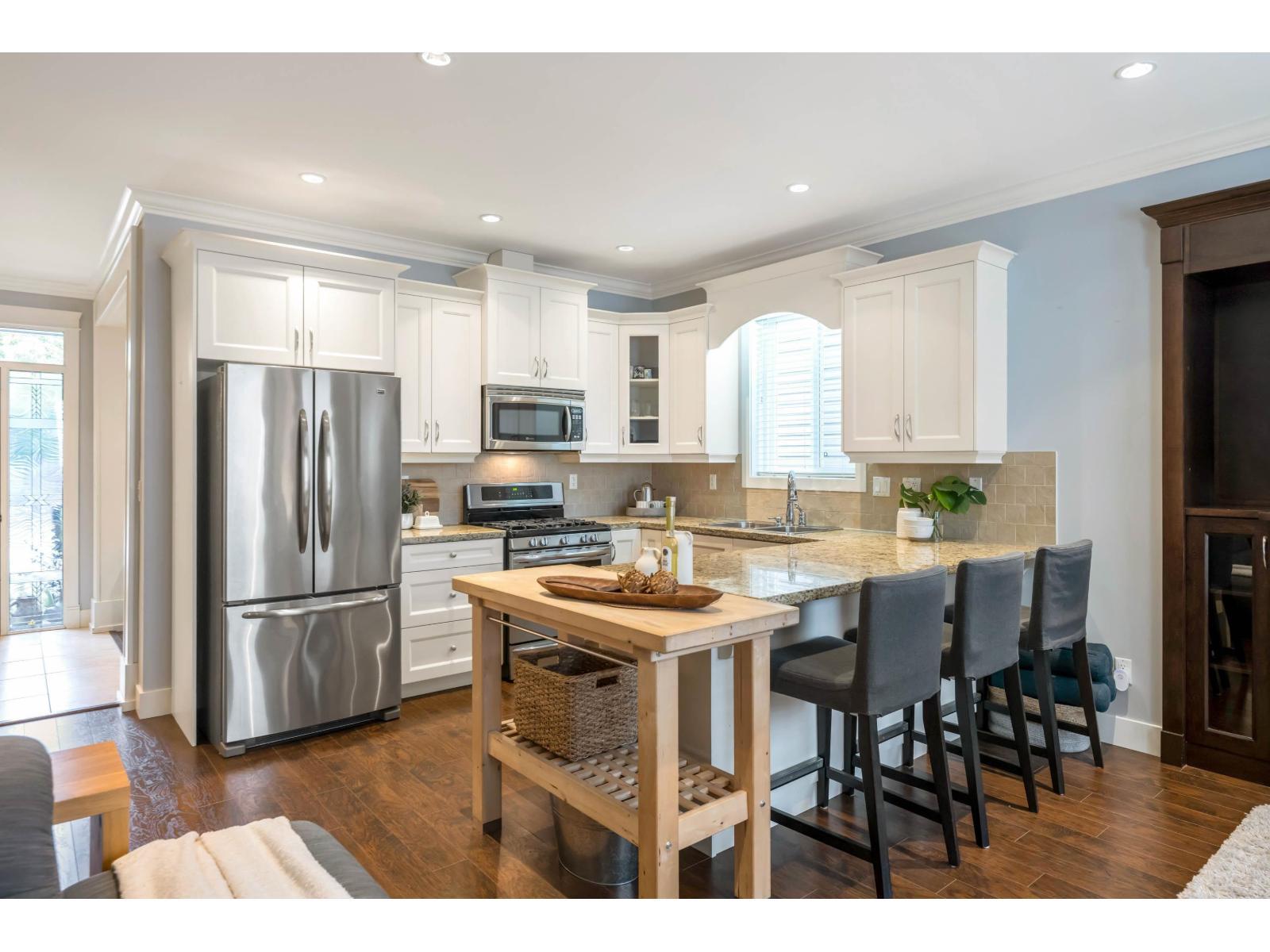 7137 196 Street, Surrey, BC - Indoor Photo Showing Kitchen With Double Sink