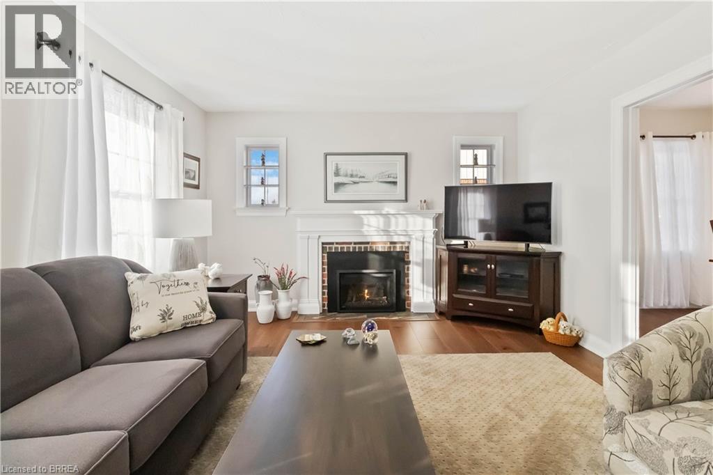 19 Baldwin Avenue, Brantford, ON - Indoor Photo Showing Living Room With Fireplace