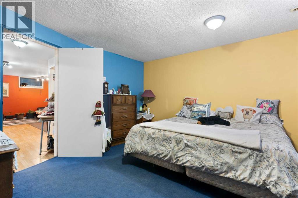 18 Greenview Crescent, Strathmore, AB - Indoor Photo Showing Bedroom