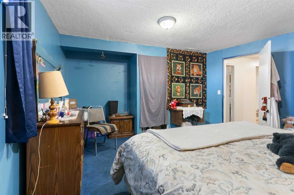 18 Greenview Crescent, Strathmore, AB - Indoor Photo Showing Bedroom