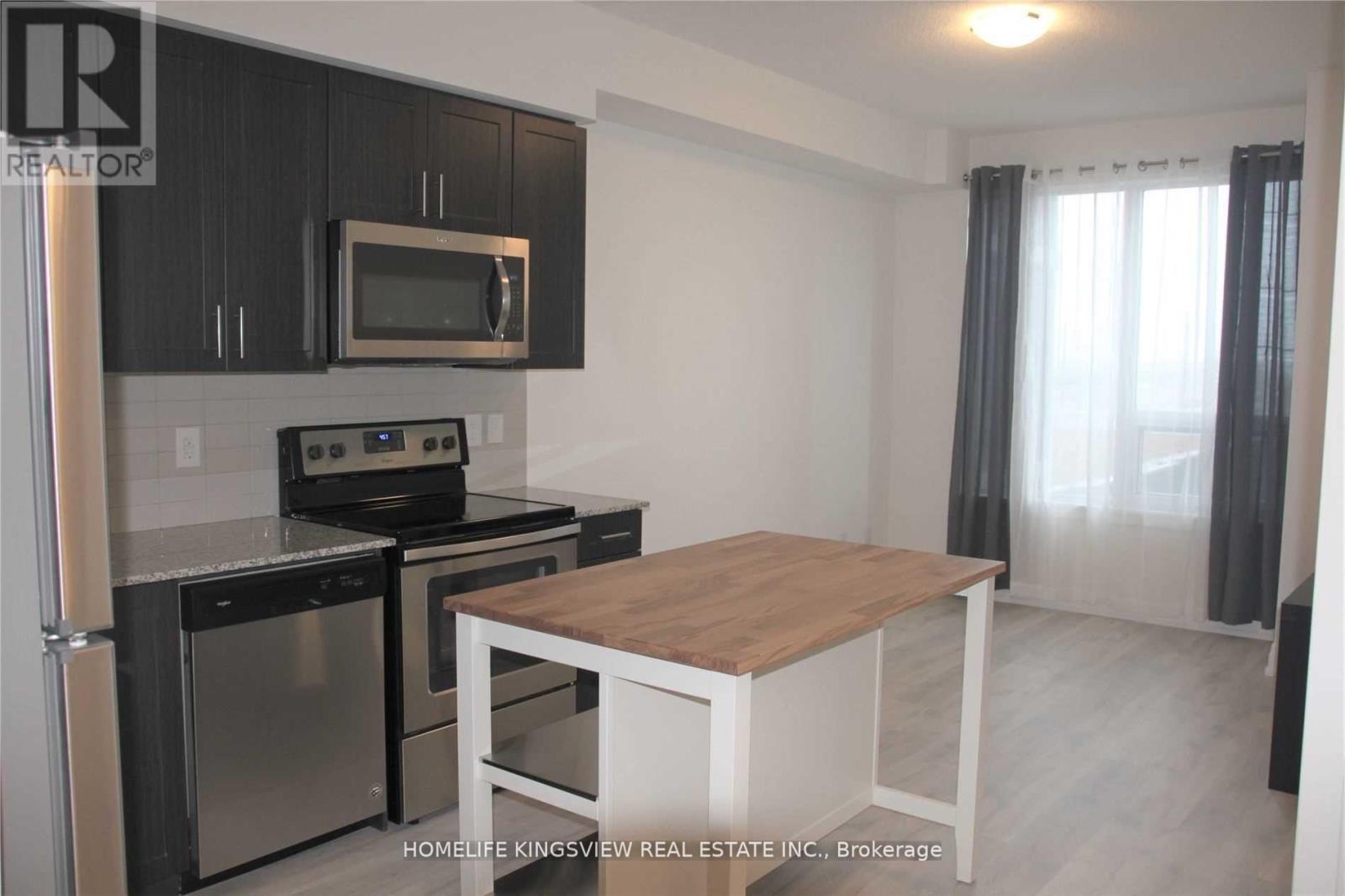504 - 3600 Highway 7, Vaughan, ON - Indoor Photo Showing Kitchen