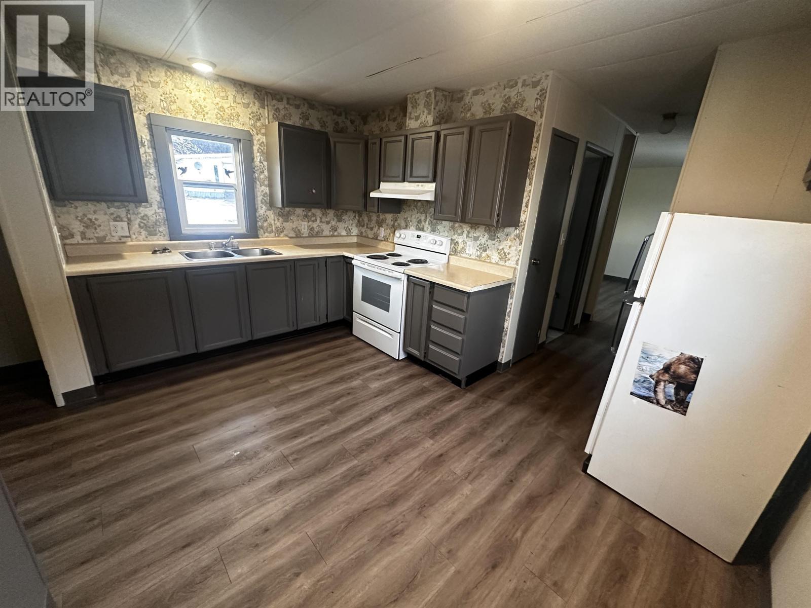 B2 160 16 Highway, Burns Lake, BC - Indoor Photo Showing Kitchen With Double Sink
