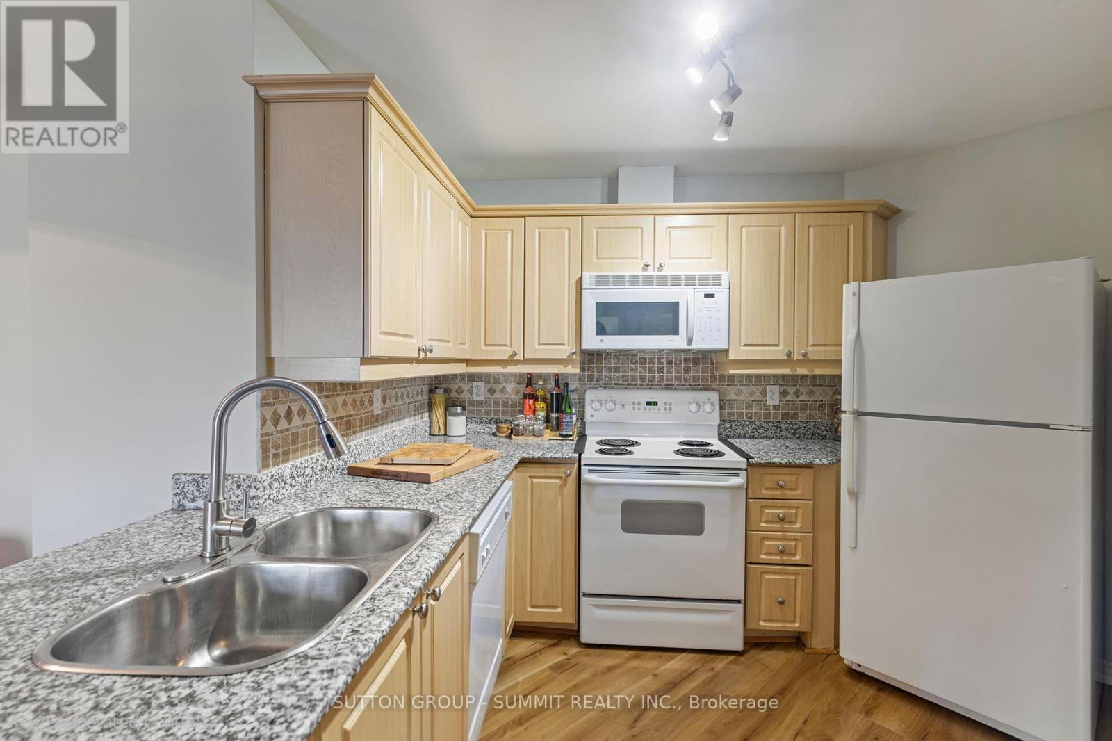 411 - 135 James Street S, Hamilton, ON - Indoor Photo Showing Kitchen With Double Sink