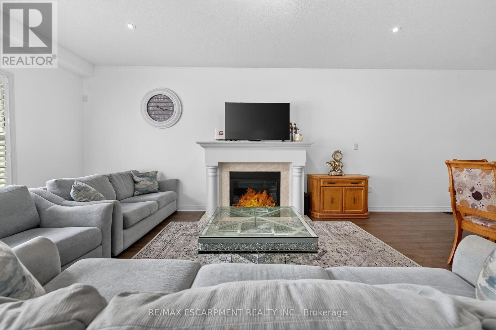 63 Chamomile Drive, Hamilton, ON - Indoor Photo Showing Living Room With Fireplace