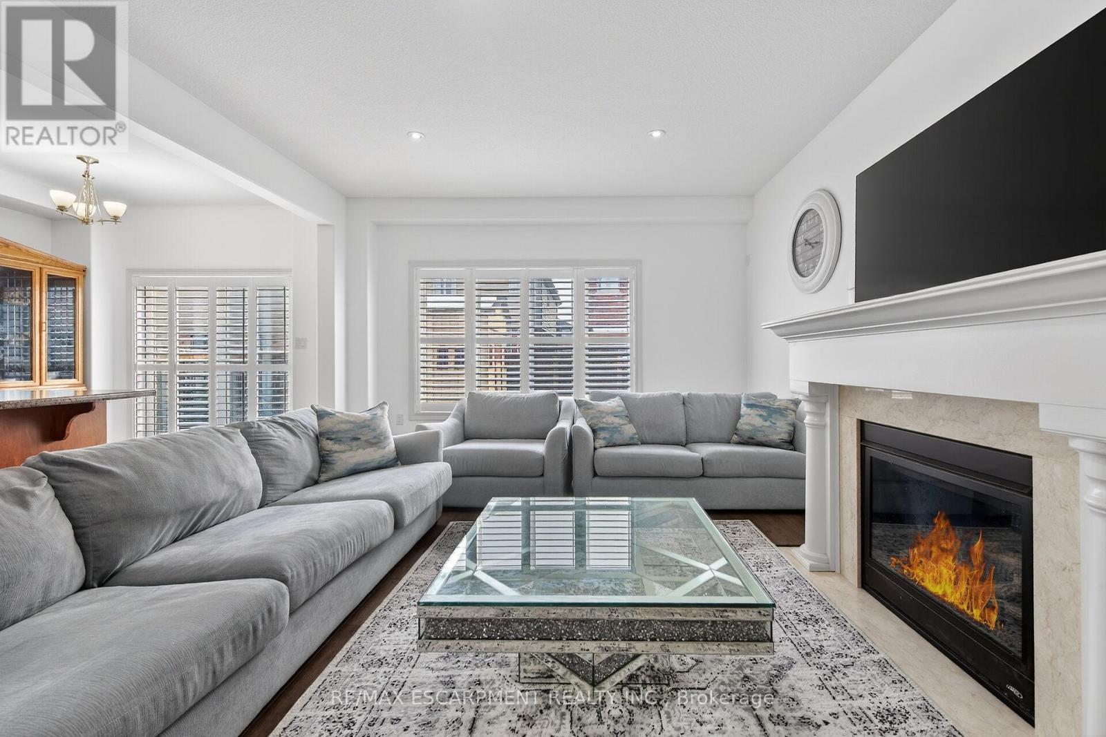 63 Chamomile Drive, Hamilton, ON - Indoor Photo Showing Living Room With Fireplace