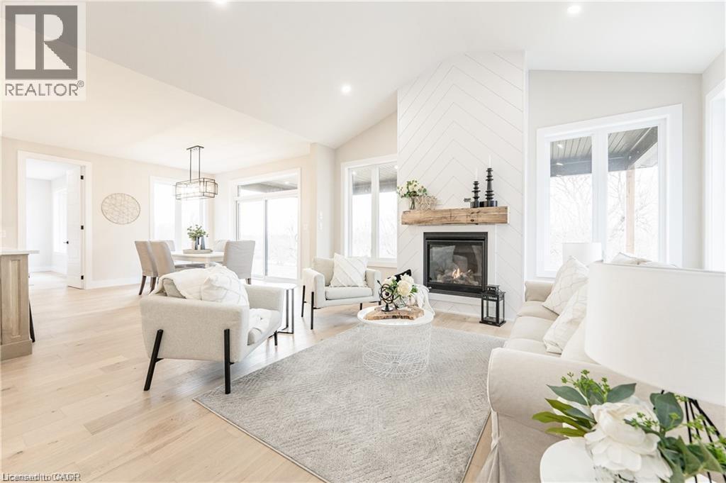 1050 Walton Avenue, North Perth, ON - Indoor Photo Showing Living Room With Fireplace