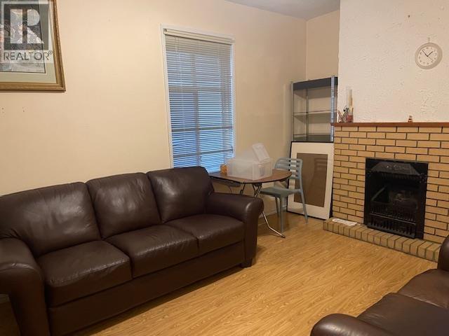 3034 Glen Drive, Vancouver, BC - Indoor Photo Showing Living Room With Fireplace