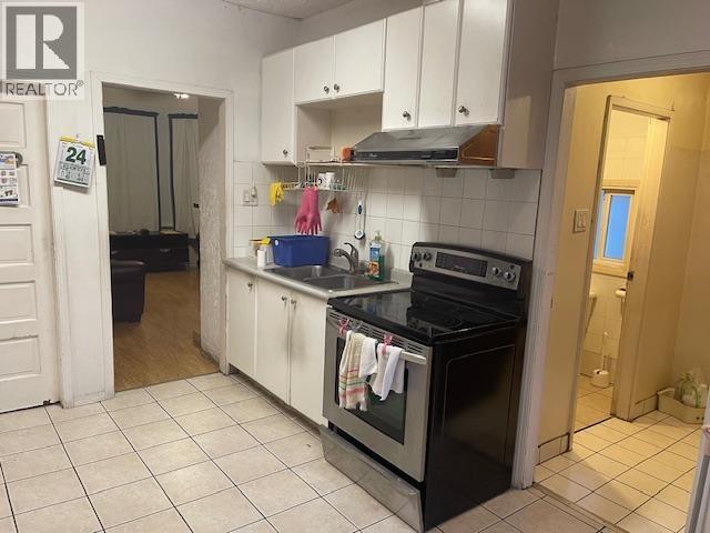 3034 Glen Drive, Vancouver, BC - Indoor Photo Showing Kitchen With Double Sink