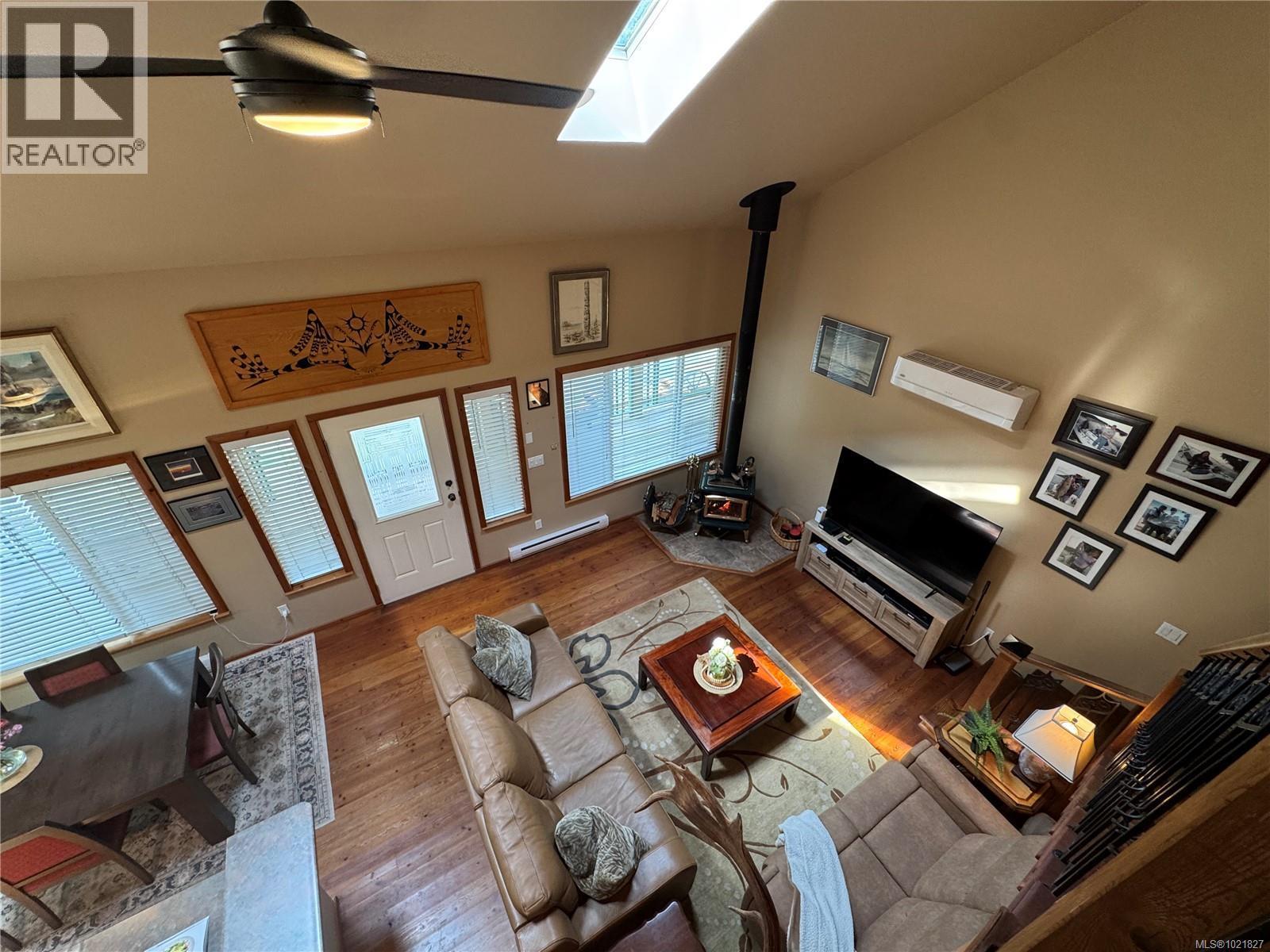 714 Charter Rd, Mayne Island, BC - Indoor Photo Showing Other Room With Fireplace