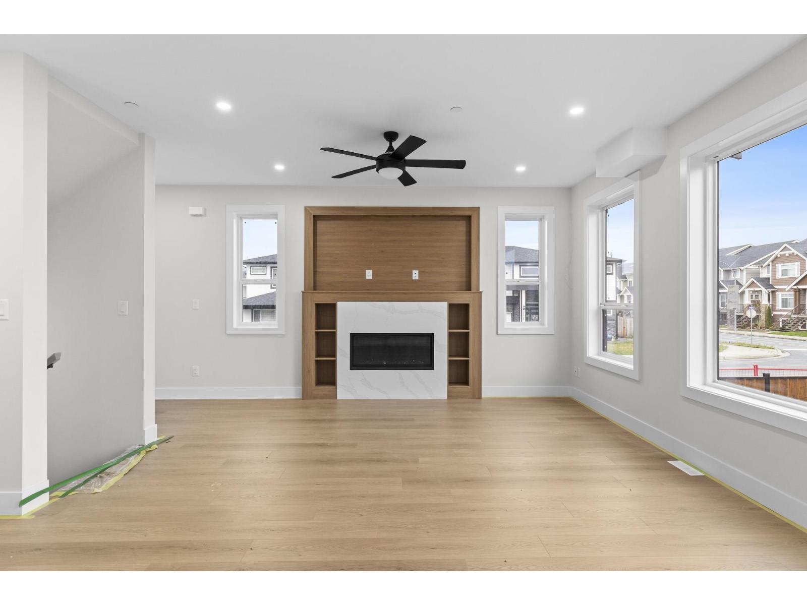 8590 Dunbar Way, Mission, BC - Indoor Photo Showing Living Room With Fireplace