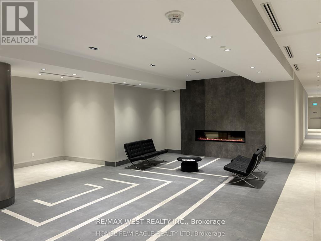 708 - 3260 Sheppard Avenue, Toronto, ON - Indoor Photo Showing Other Room With Fireplace