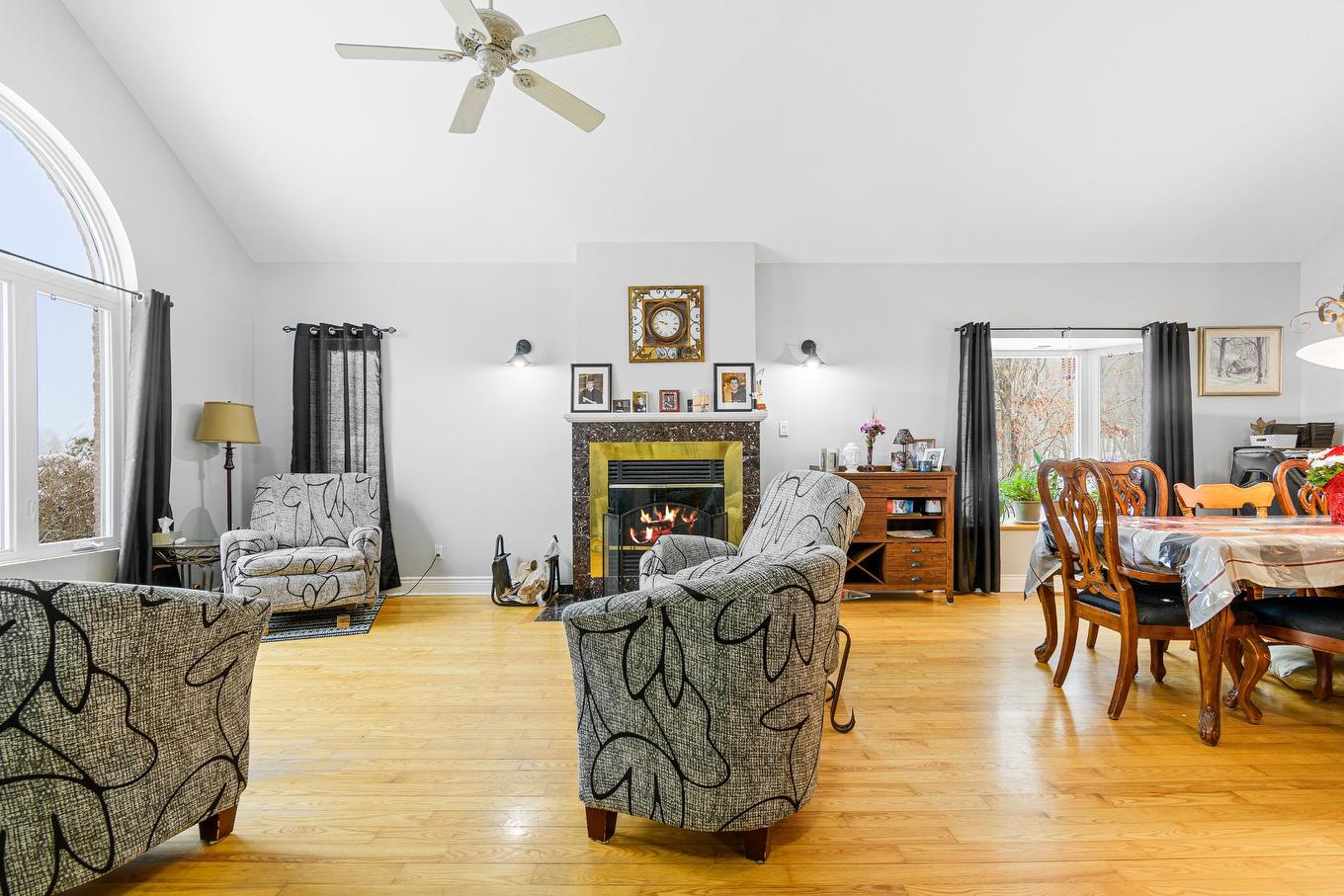 Living room - 58 Rue Binette, Brownsburg-Chatham, QC - Indoor Photo Showing Living Room With Fireplace