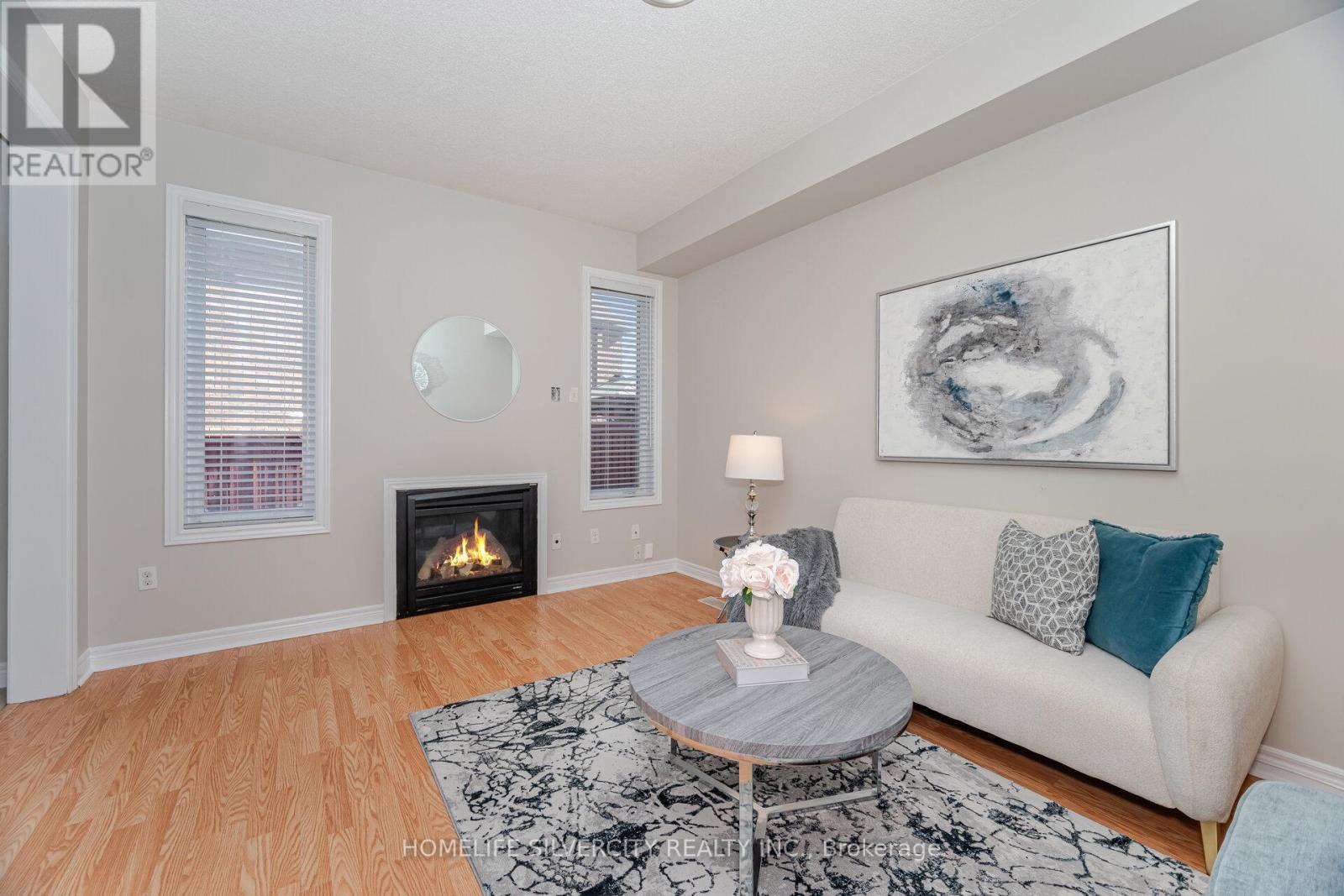 105 Aylesbury Drive, Brampton, ON - Indoor Photo Showing Living Room With Fireplace