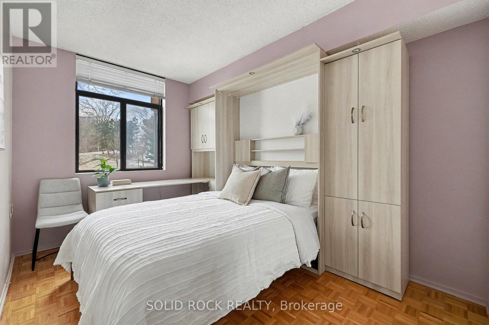 Bedroom 2- has a murphy bed! - 108 - 2871 Richmond Road, Ottawa, ON - Indoor Photo Showing Bedroom