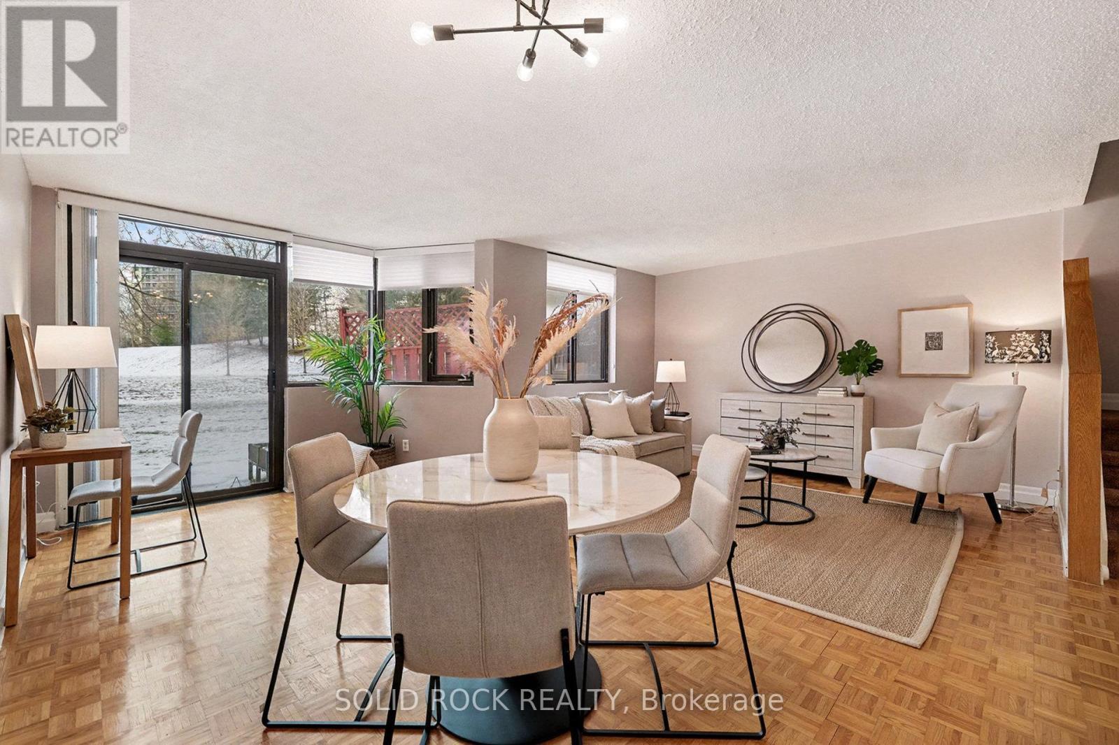 Open concept living/dining and sitting areas - 108 - 2871 Richmond Road, Ottawa, ON - Indoor Photo Showing Dining Room