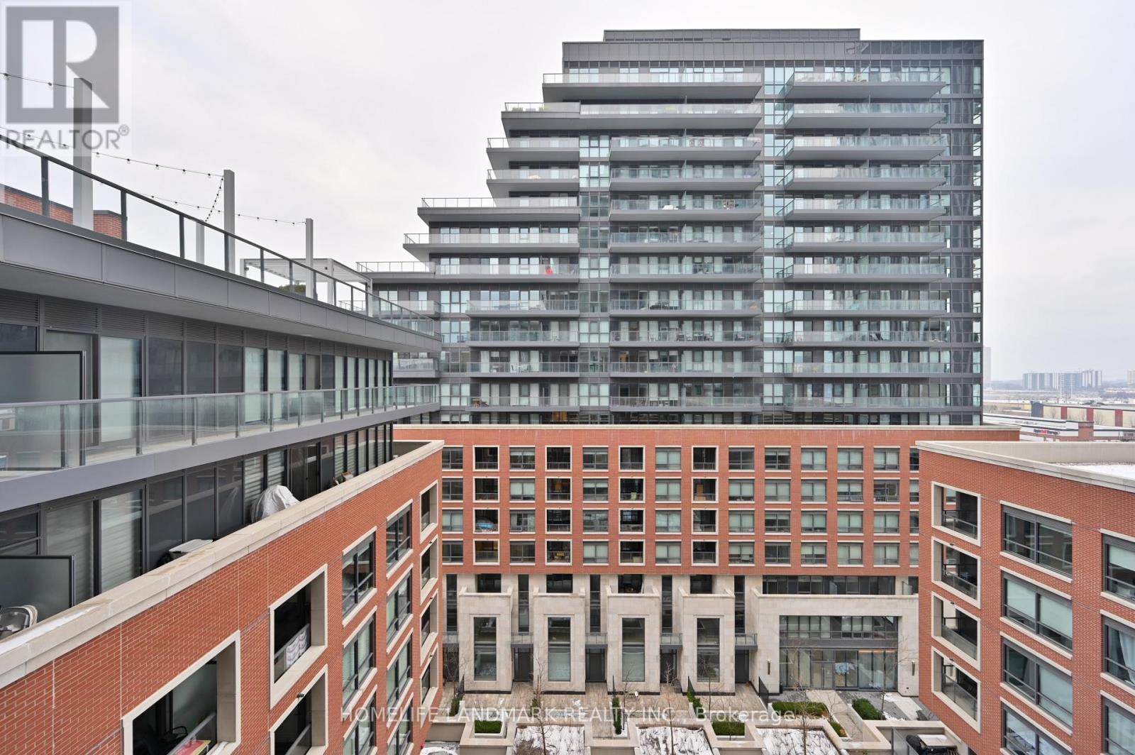 814 - 33 Frederick Todd Way, Toronto, ON - Outdoor With Balcony With Facade