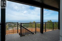 Balcony featuring a water view -