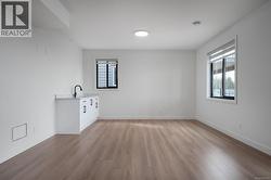 Spare room with light wood-style flooring and plenty of natural light -