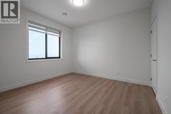 Room with featuring light wood-style floors and baseboards -