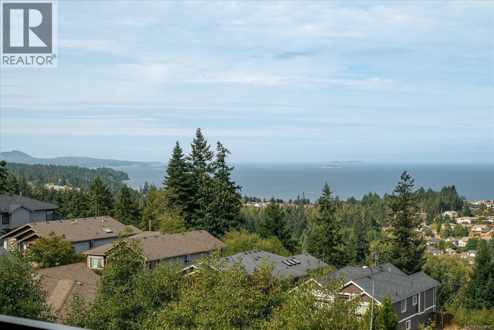 Drone / aerial view of a nearby body of water - 4680 Ambience Dr, Nanaimo, BC - Outdoor With Body Of Water With View