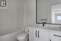 Full bath with vanity and shower combination -