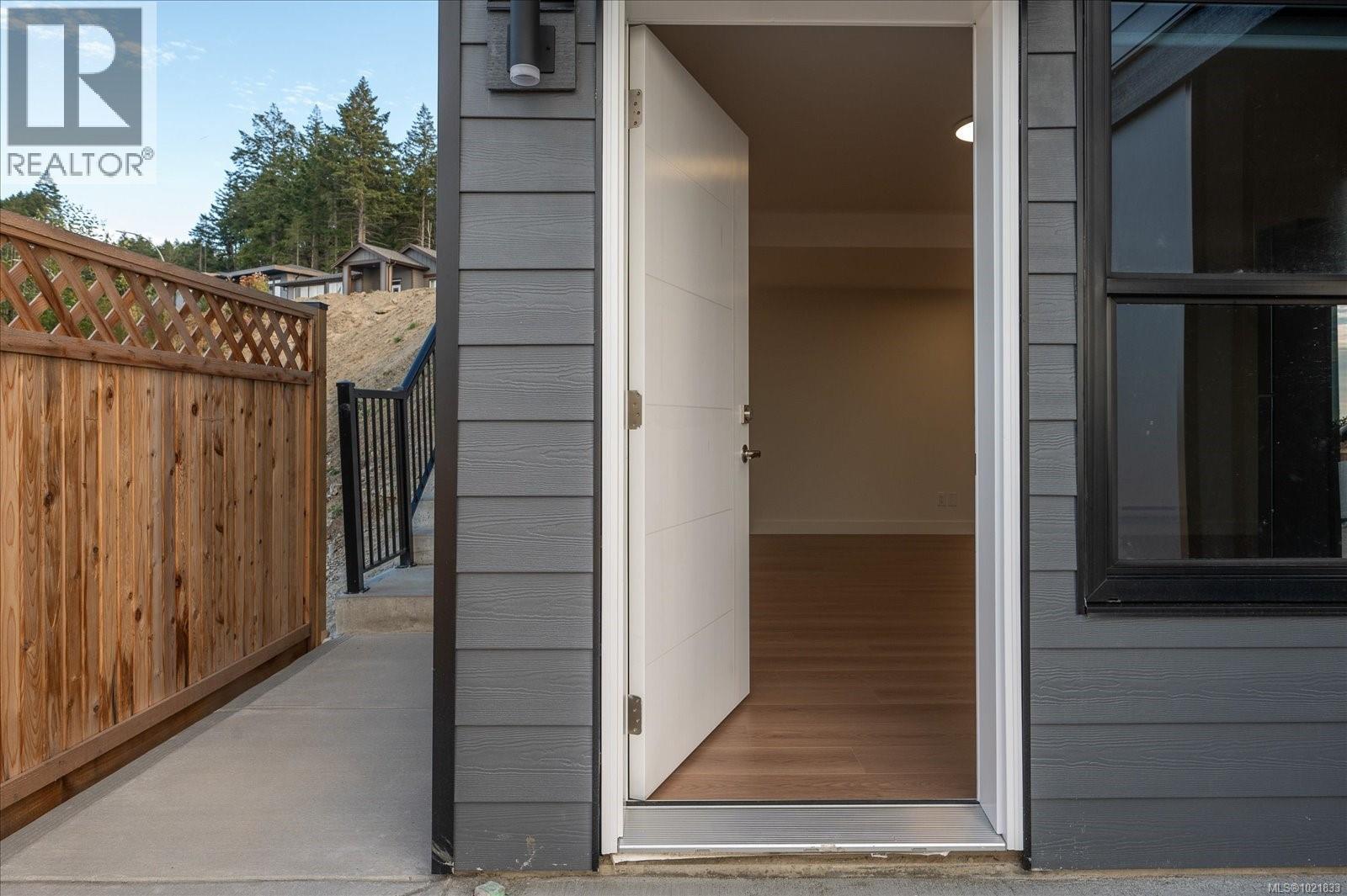 View of exterior entry - 4680 Ambience Dr, Nanaimo, BC - Outdoor With Exterior