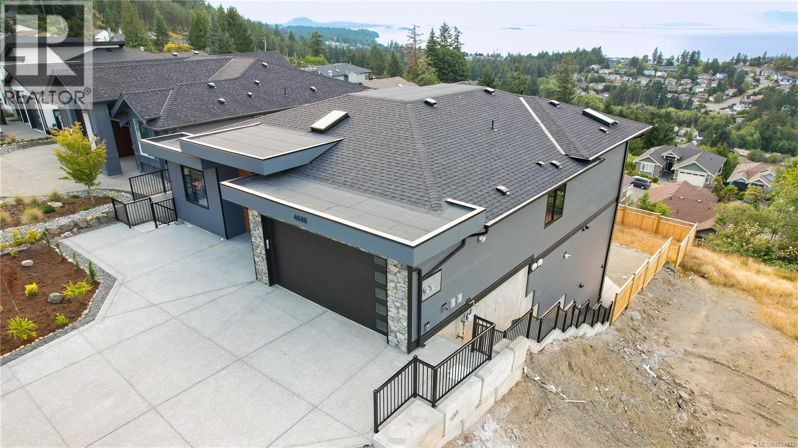 Aerial view of residential area - 4680 Ambience Dr, Nanaimo, BC - Outdoor With Deck Patio Veranda