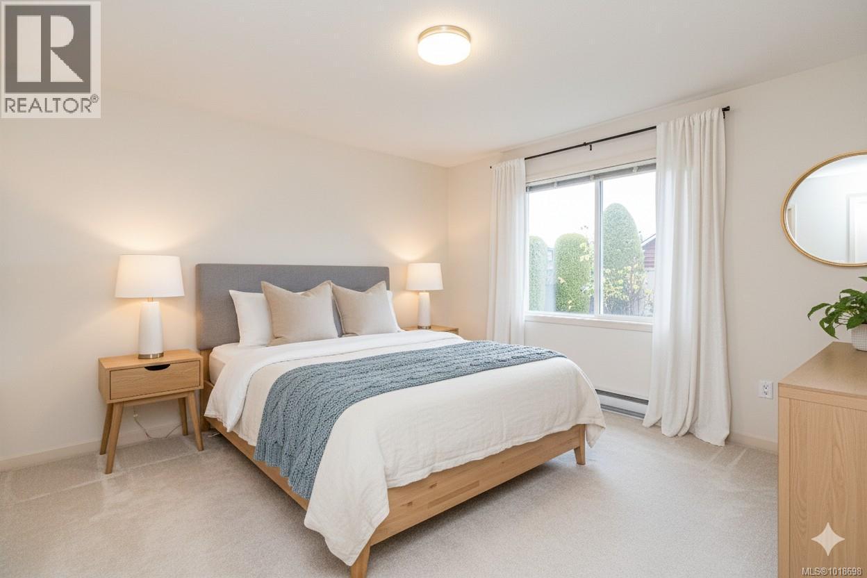 VIRTUALLY STAGED Primary Bedroom - 751 Anson Pl, Qualicum Beach, BC - Indoor Photo Showing Bedroom