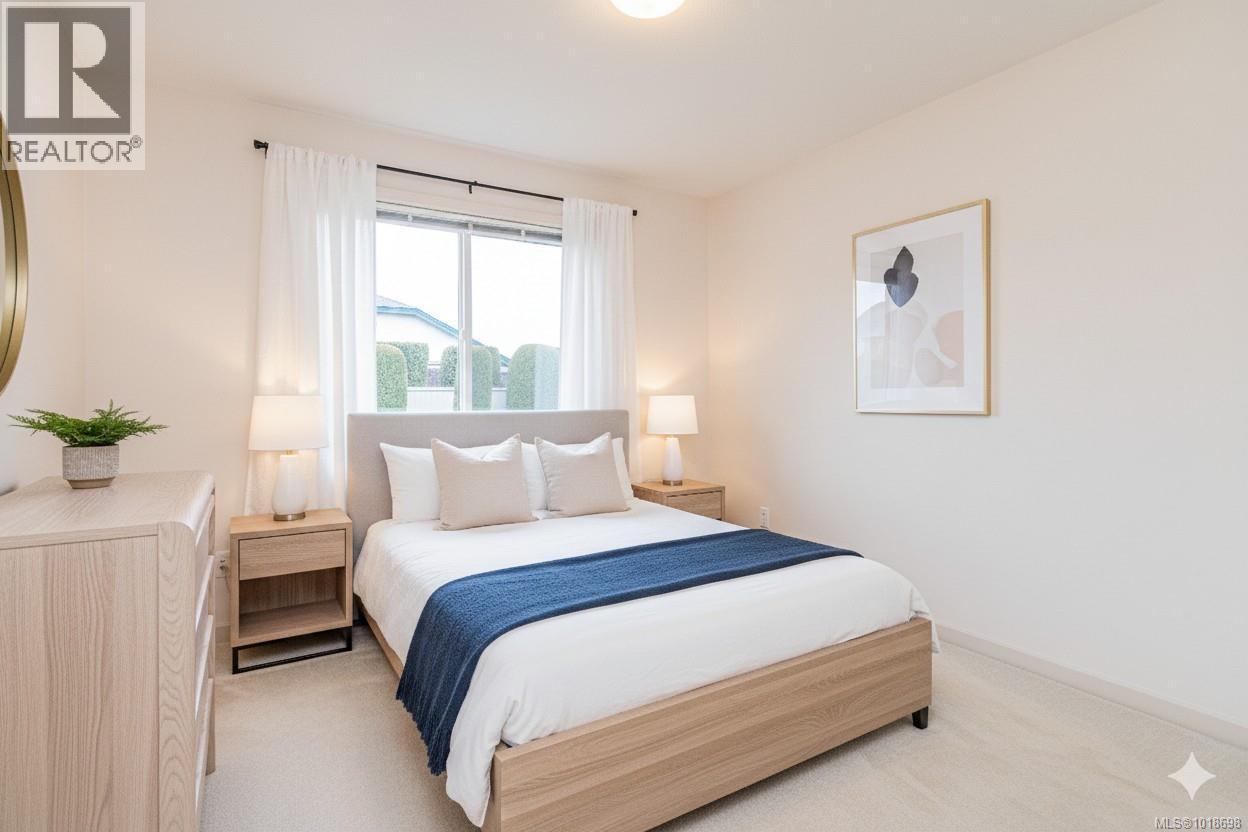 VIRTUALLY STAGED Guest Bedroom - 751 Anson Pl, Qualicum Beach, BC - Indoor Photo Showing Bedroom