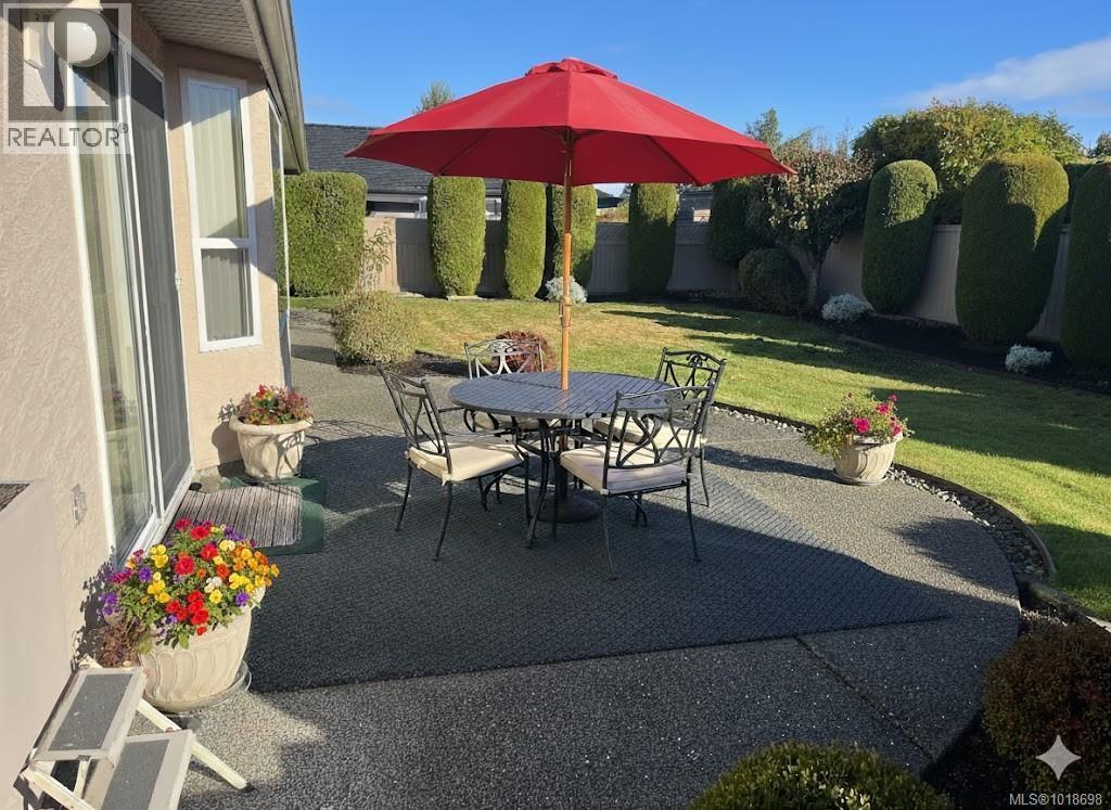 VIRTUALLY STAGED Back Patio - 751 Anson Pl, Qualicum Beach, BC - Outdoor With Deck Patio Veranda
