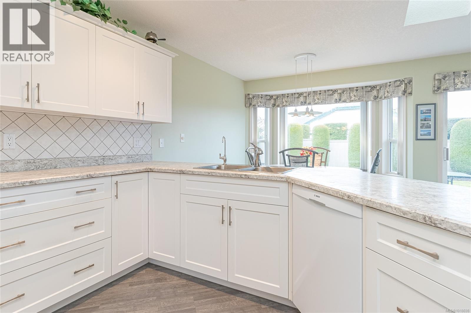 KItchen - 751 Anson Pl, Qualicum Beach, BC - Indoor Photo Showing Kitchen With Double Sink