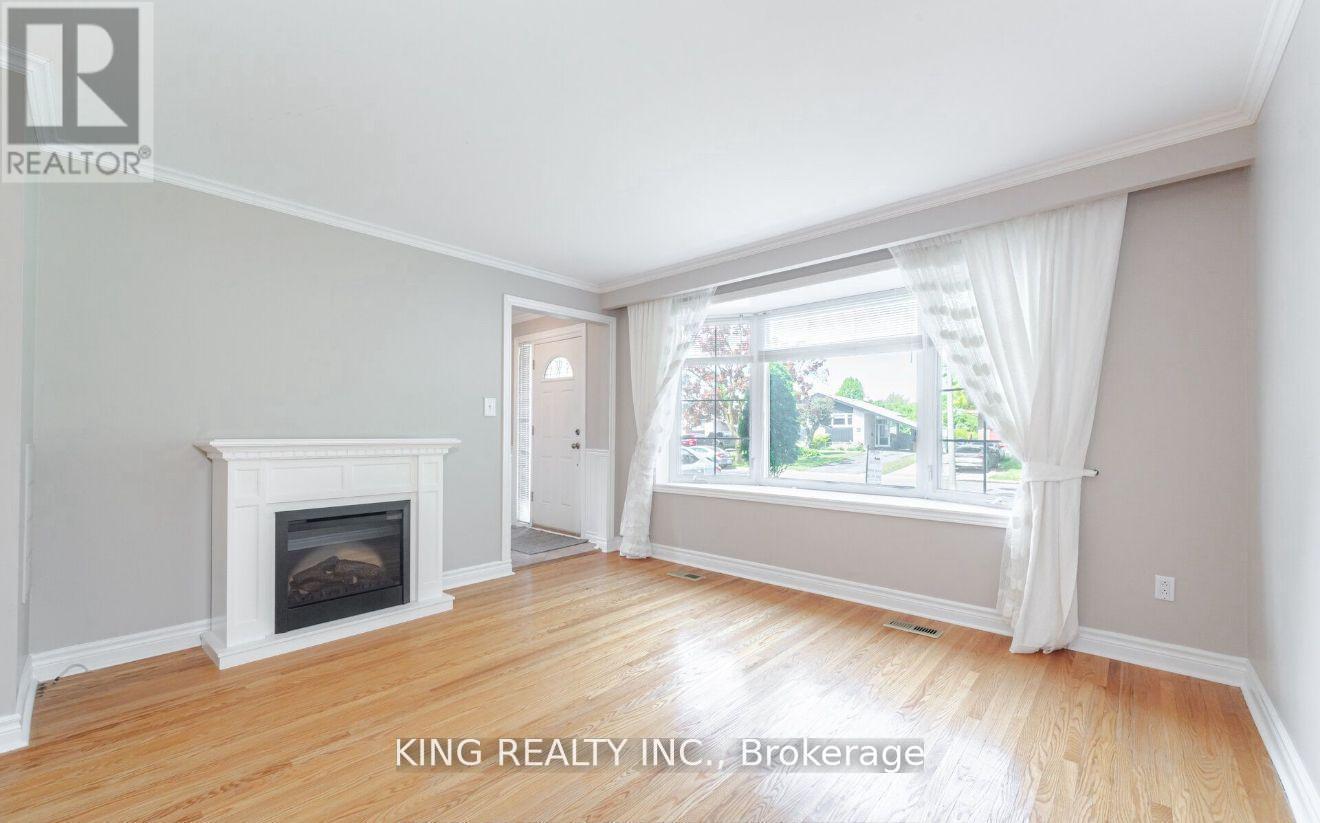 43 Grange Drive, Brampton, ON - Indoor Photo Showing Living Room With Fireplace