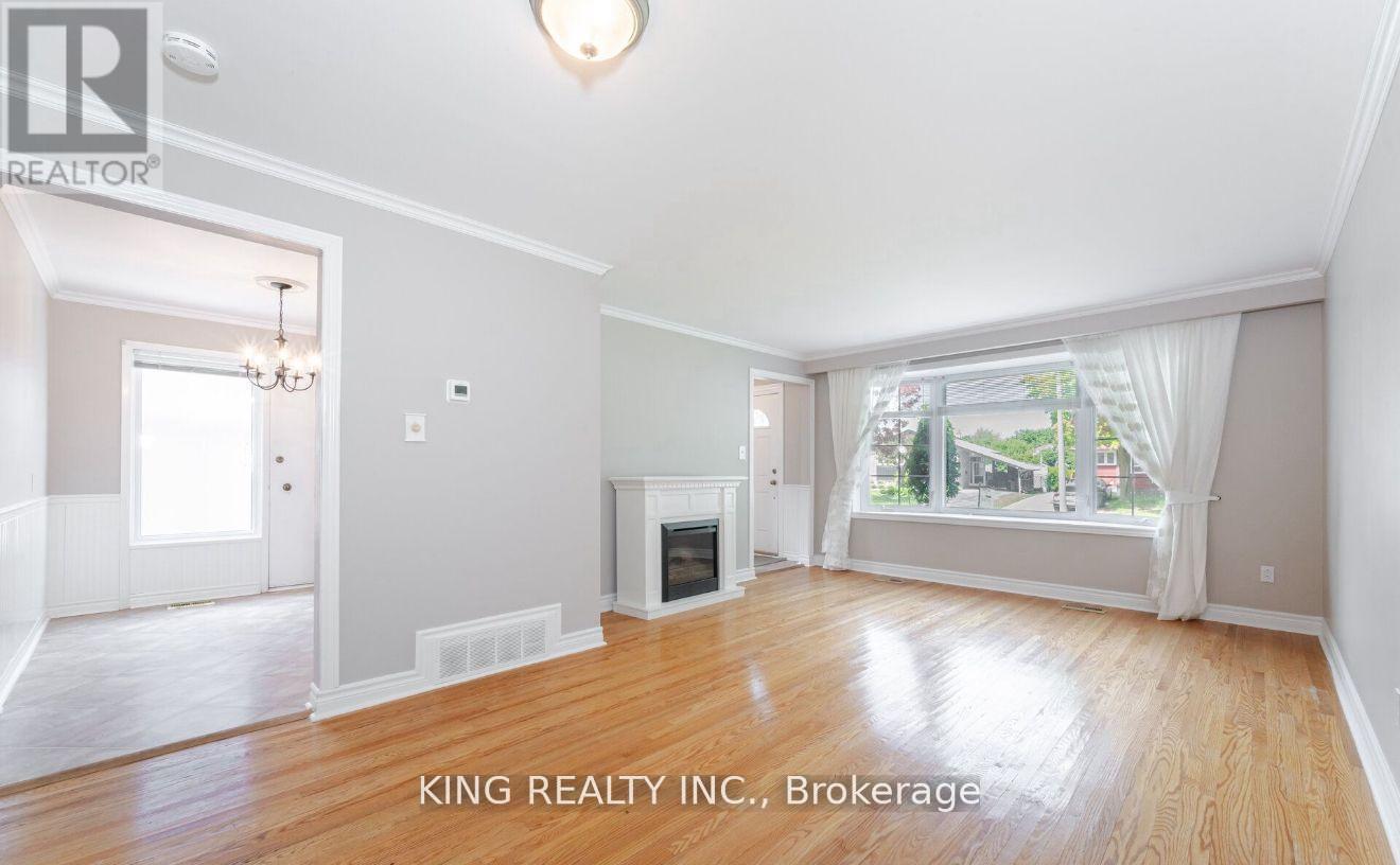 43 Grange Drive, Brampton, ON - Indoor Photo Showing Living Room With Fireplace