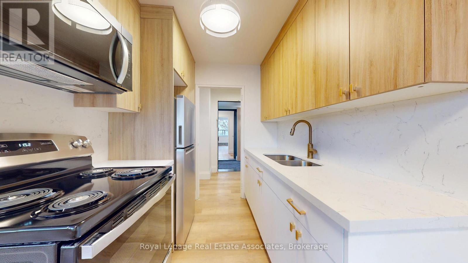 GALLEY KITCHEN - 23 - 1 Marquette Avenue, Toronto, ON - Indoor Photo Showing Kitchen With Double Sink