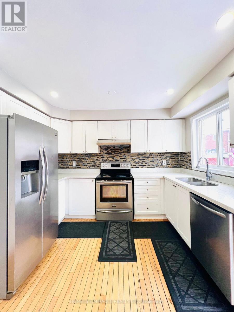 16 Marshmarigold Drive, Brampton, ON - Indoor Photo Showing Kitchen With Stainless Steel Kitchen With Double Sink With Upgraded Kitchen