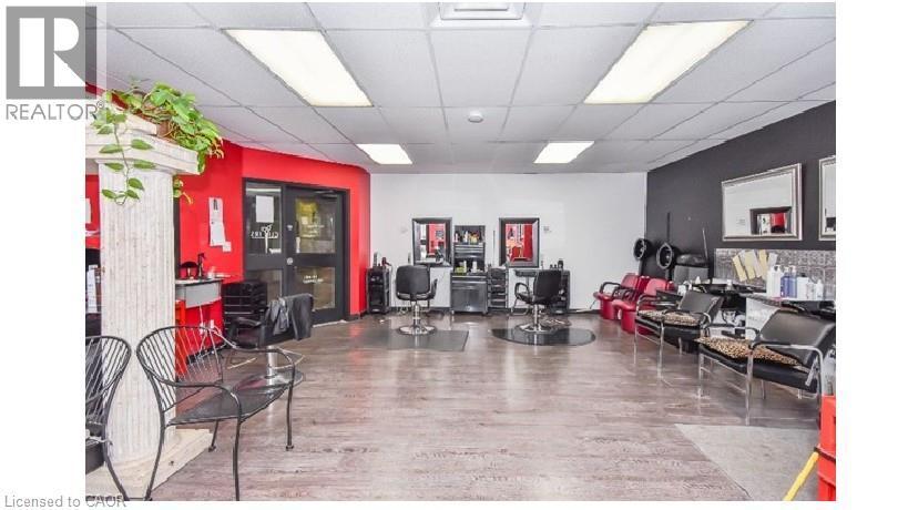 Misc room featuring a paneled ceiling - 25 Main Street Unit# 102, Cambridge, ON