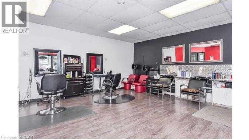 Misc room featuring a paneled ceiling - 25 Main Street Unit# 102, Cambridge, ON