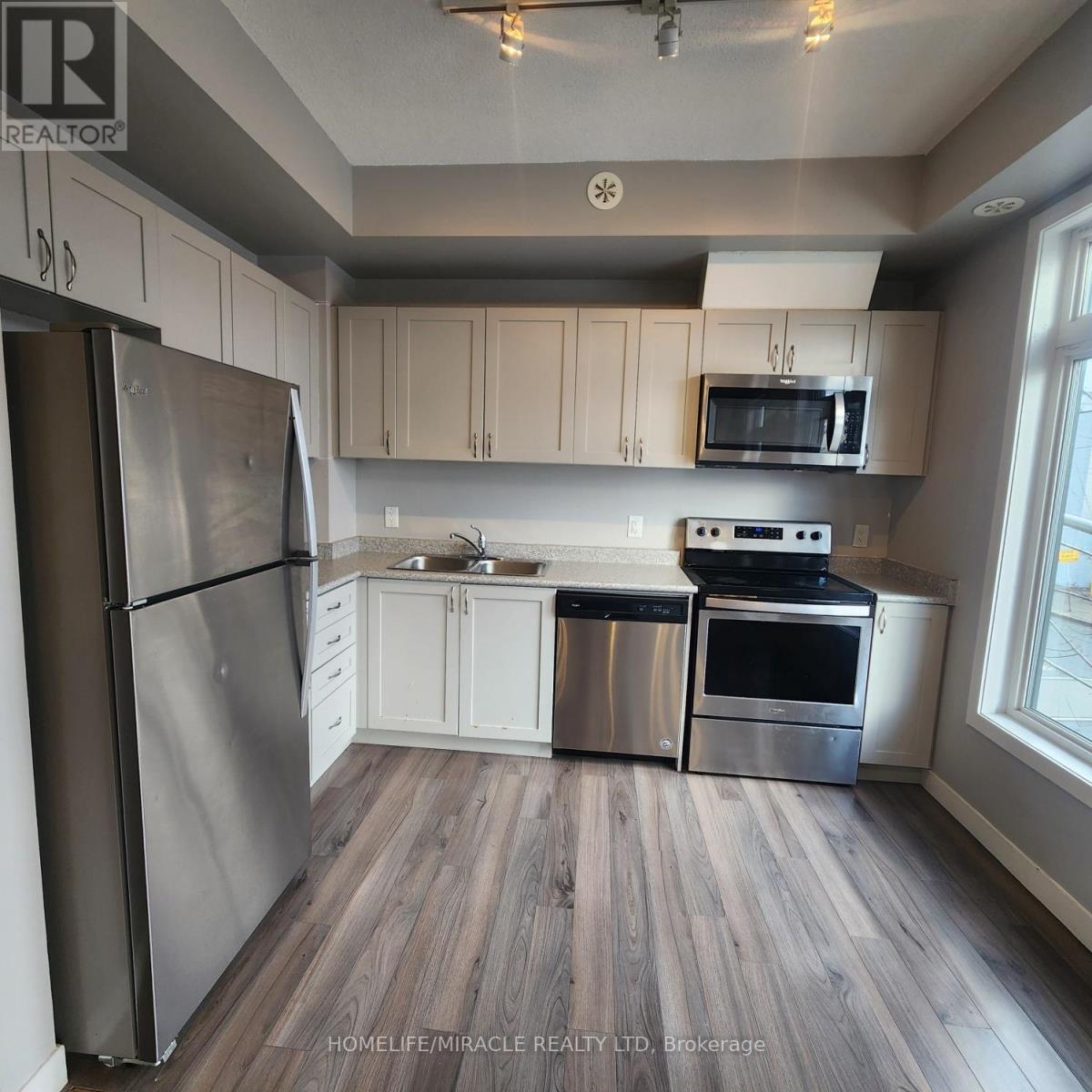 14 - 630 Rogers Road, Toronto, ON - Indoor Photo Showing Kitchen With Stainless Steel Kitchen With Double Sink
