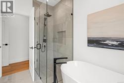 5 piece ensuite with walk in shower and soaker tub. -