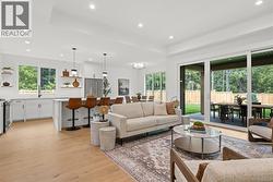 Bright open concept - with easy access to the covered patio -