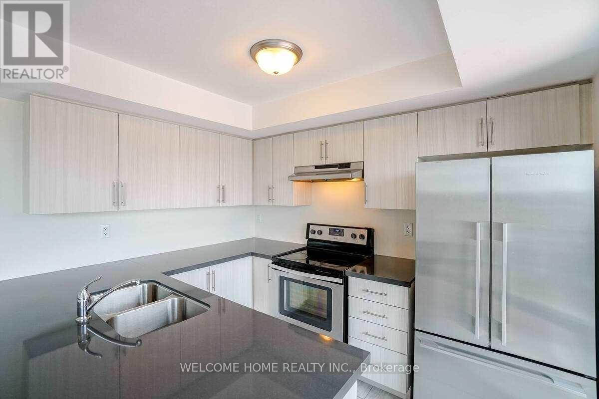 19 - 100 Dufay Road, Brampton, ON - Indoor Photo Showing Kitchen With Upgraded Kitchen