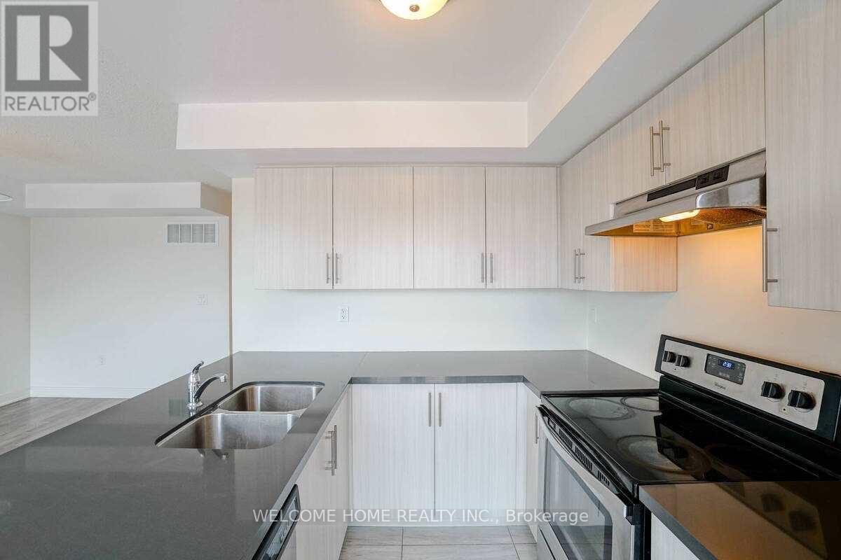 19 - 100 Dufay Road, Brampton, ON - Indoor Photo Showing Kitchen With Double Sink